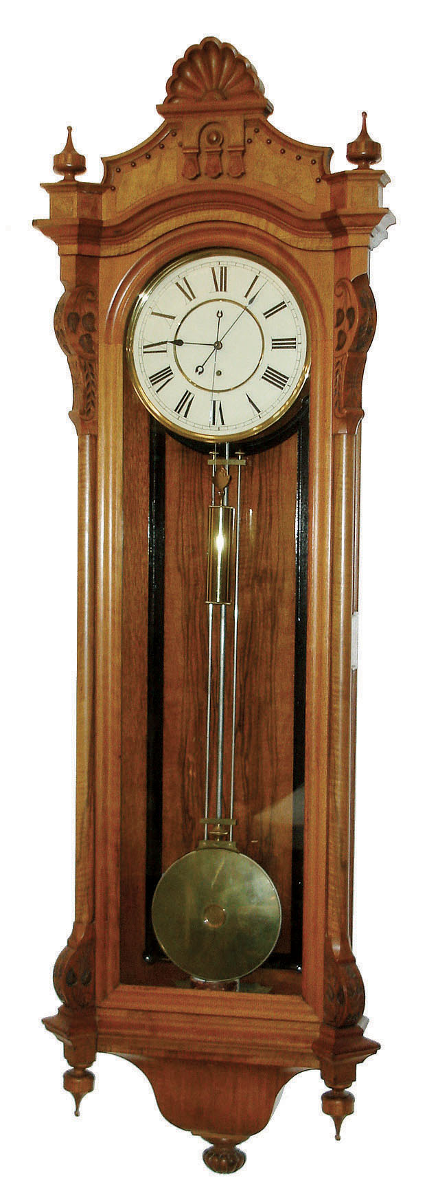 Seth Thomas Clock Co., Thomaston, Conn., "Regulator No. 16" wall clock, 8 days, time only, brass weight driven movement earlier version mounted on the standard No. 3 bracket with center sweep seconds in a walnut case with black walnut back panel and burled highlights and painted metal dial, c1884 — Antique Clocks Price Guide