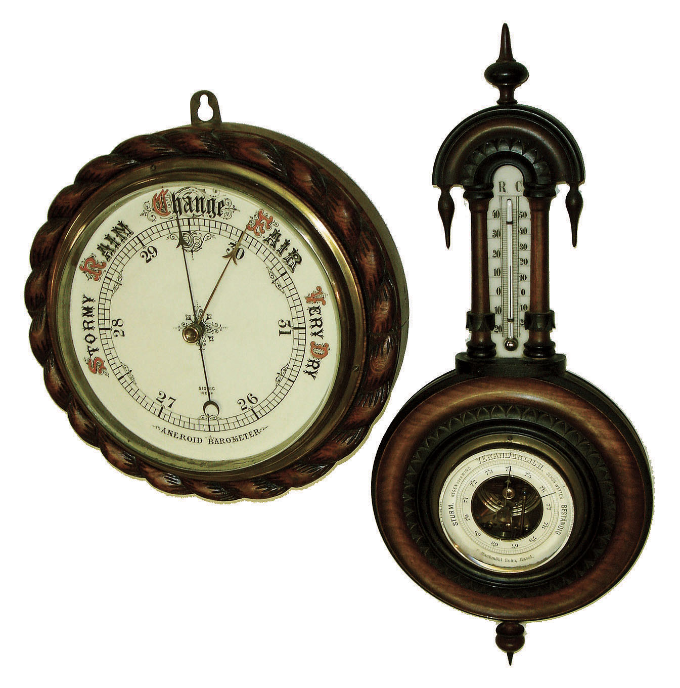 Barometers- 2 (Two) aneroid in carved walnut hanging cases; one signed Sidric, the other "F Rachmuhl Sohn, Basel." — Antique Clocks Price Guide
