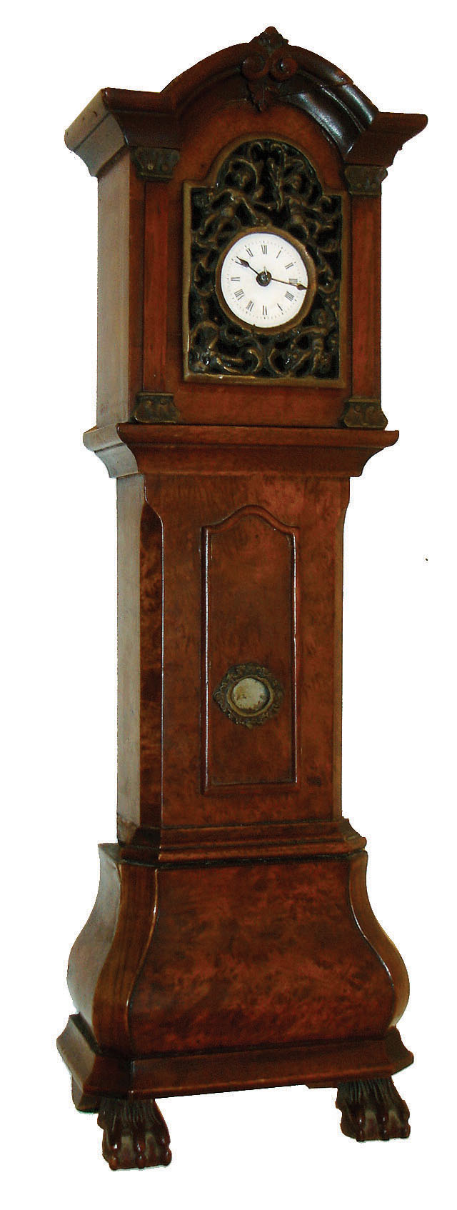 Miniature tall clock, burl walnut veneered case in the Dutch style, cast brass shield with scroll ornament and putti, Roman numeral white enamel dial, French 8 day timepiece movement with platform escapement, 19th century — Antique Clocks Price Guide