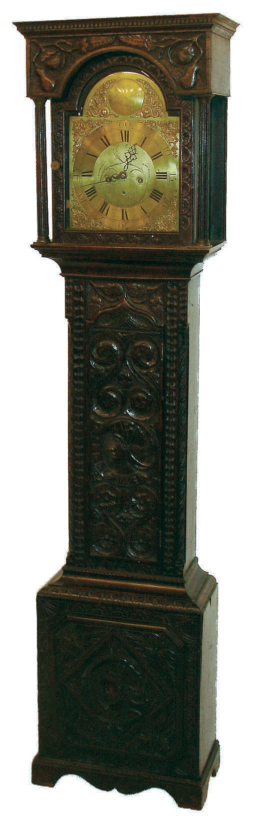 Jos. Atkinson, Gateshead, England, tall clock, 8 days, time, calendar and bell strike, weight driven movement in a heavily carved oak case with flat top hood, brass dial, case late 18th century, movement mid 18th century — Antique Clocks Price Guide