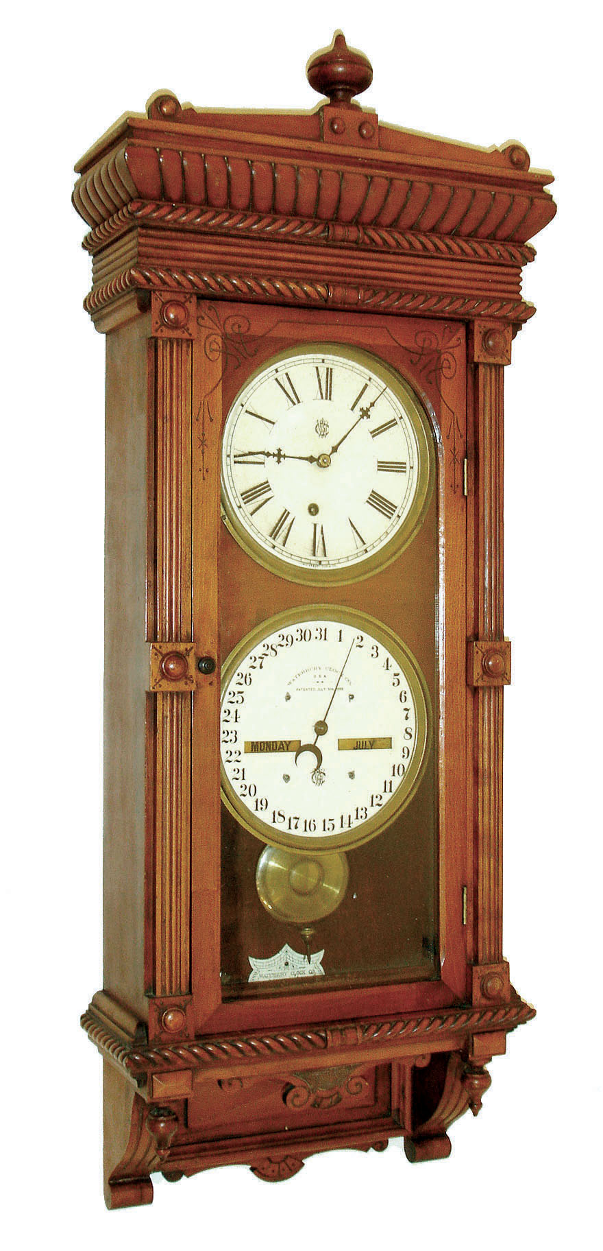 Waterbury Clock Co., Waterbury, Conn., "Calendar No. 30" wall clock, 8 days, time and perpetual calendar, spring driven movement in a cherry case with painted metal dials, c1891 — Antique Clocks Price Guide