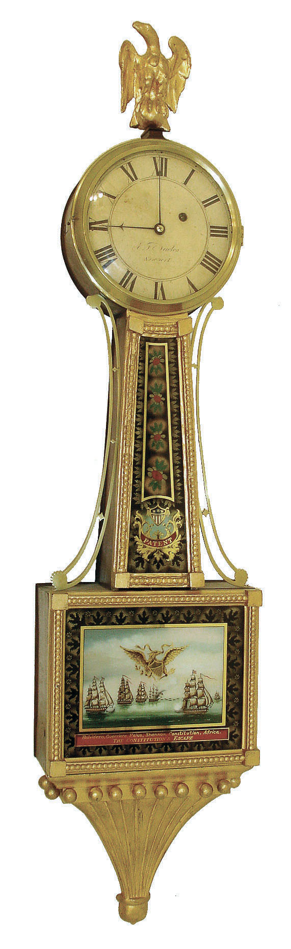 E. F. Newton, newport, Rhode Island, banjo clock, mahogany case with gilt frames, and carved, gilt presentation bracket with acorn drop, carved gilt eagle finial, cast brass sidearms with decorative terminals, oprnate brass pendulum tie down, signed Roman numeral white painted dial, blued steel hands, brass 8 day A frame plate timepiece movement, c1830 — Antique Clocks Price Guide