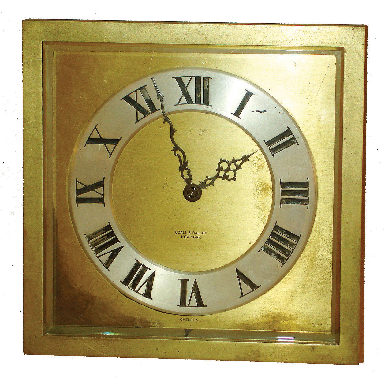 Chelsea Clock Co., Boston, for Udall &amp; Ballou, New York, "Raleigh" model 8 day time only, 8" easel desk clock in brass and beveled glass case, #180828, 1927 — Antique Clocks Price Guide