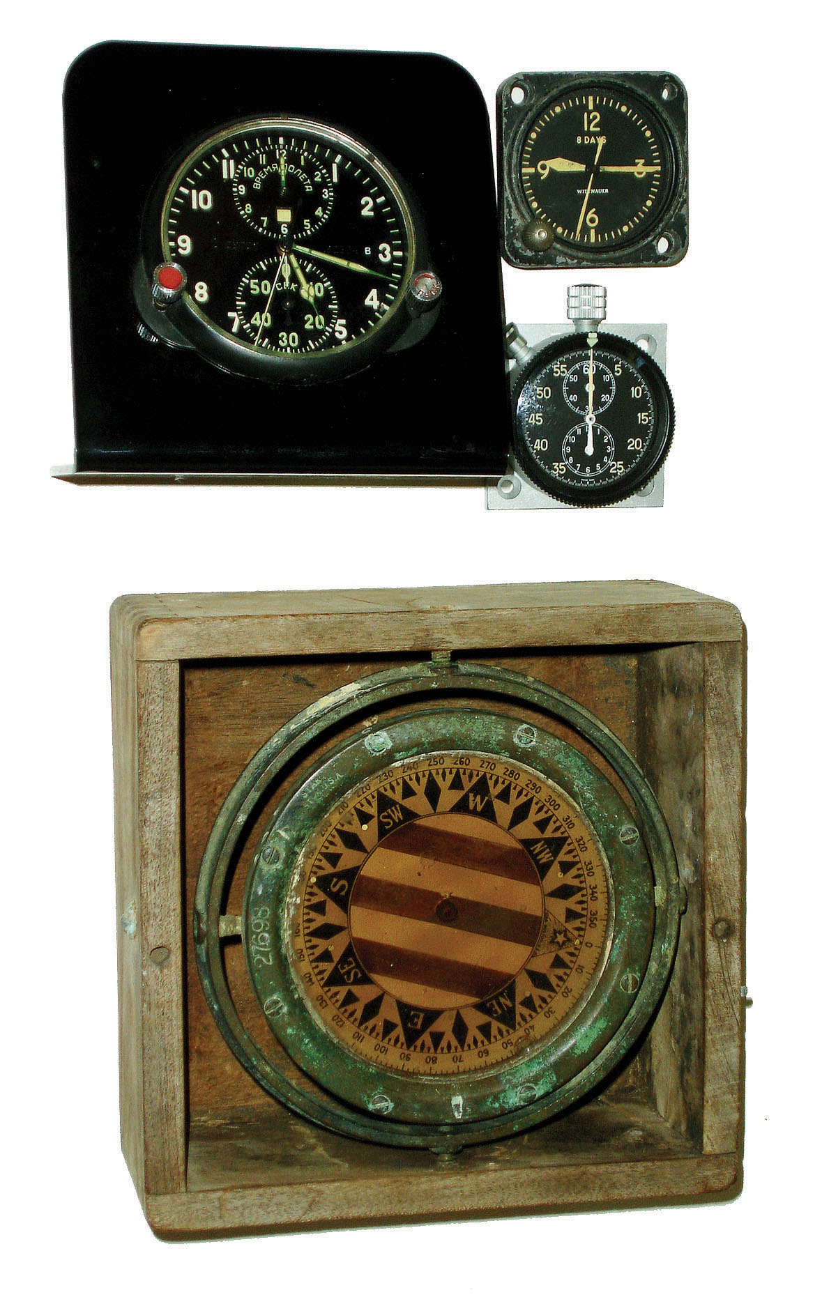 Navigational Instruments - 4 (Four): Russian 3" dial aircraft clock on acrylic stand with signed and numbered dial and rear electric terminals; Wittnauer 2" dial 8 day aircraft clock; Swiss aircraft stopwatch on aluminum mount plate; Star, Boston, gimbaled floating compass in wood box (no cover). — Antique Clocks Price Guide