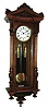 Clocks- 2 (Two) German 8 days,two weight Vienna Regulator style wall clocks in walnut cases, late 19th century.