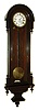 Clocks- 2 (Two) clocks, German 8 days,three-weight grand-sonnerie striker signed "Keresztes Lal, Verszpremben" in walnut case; Austrian 8 days,two-weight signed "Frs Maier" in walnut case, both late 19th century.