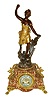 France, figural mantel clock, the variegated pink marble case with gilt paw feet, gilt dial surround and with gilt side ornaments, the top with patinated female figure, the base with engraved plaque , "Les Bles par Belin", Roman numeral enamel dial in blue and gold, the center with painting of 2 birds and roses, gilt hands, 8 days, time and strike, pendule a Paris movement, c1900