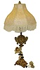 Painted metal figural electric lamp with Ansonia rear-wind 30 hour clock, c1920