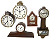 Clocks- 5 (Five) alarm and novelty: Ansonia small 8 day time only, mahogany tambour; Burroughs "No.49T Steeple Gothic" time only; two Ansonia oversize alarm clocks, one marked "Amazon"; New Haven 12-day miniature banjo; early 20th century