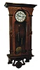 Gustav Becker, Germany, Vienna regulator, Nouveau influenced walnut and walnut veneered case with carved ornament, Arabic numeral white enamel dial, pierced blued steel hands, signed 8 days, time and strike, weight driven movement, polished brass pendulum and weights, c1900