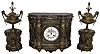 France, 3 piece mantel garniture, dovetailed oak clock case with underpainted horn veneer, colored to appear as marble, with gilt mounts and moldings, and extensive use of brass line inlay, Roman numeral white enamel dial with open Brocot escapement, blued steel Breguet style hands, 8 days, time and strike, pendule a Paris movement, back with brass framed glazed door, the plinth form side pieces with finishes and ornament matching the clock case, and supporting covered, cast brass urns with foliate and Grecian style ornament, c1870