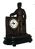 German, animated alarm timepiece, a patinated spelter signalman waves his lantern to alarm visually; with one day time and alarm movement, cast figure mounted to an ebonized wooden base, c1890