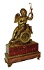 France, first half 19th century, bronze figural clock, depicting a young winged archer, and with a good silk thread pendule a Paris movement, silvered engine turned brass dial, Breguet style moon hands, c1830