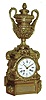 France, Houri, Voisin, large gilt bronze mantel clock, surmounted by a large, ornate, swagged urn, with conventional early Japy movement with silk thread suspension mounted in the base. This case is usually found with an orbital or rotating dial near the top of the urn, however, this model is original, as shown, c1840