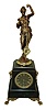 France, "Mystery" clock, the movement contained within the black marble base below, and with statue mounted to a central pivoting base, the pendulum suspended from the female's arm, and swinging without apparent impulse, c1880