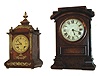 Clocks- 2 (Two) Connecticut Shelf: (1) New Haven Clock Co., New Haven, Conn., "Lurine" model spring driven 15 day time and strike (hour and half hour on cathedral gong) in oak case, c1889.  (2) Seth Thomas Clock Co., Thomaston, Conn., "Arch Top" model spring driven 8 days, time and strike, in burl walnut case, c1885.