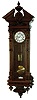 Vienna Regulator wall clock, attributed to Christian Schlenker, Schwennigen, Germany, 8 days, time and strike, two brass weight driven movement in a carved walnut case with two part white enamel dial with subsidiary seconds, c1870