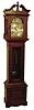 Germany, Emperor tall clock, 8 day time, strike & chime, three brass weight driven movement in a cherry case with brass dial, silvered chapter ring and moon phase, c1970