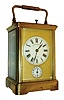 France, 8 days, time, strike & repeating on demand platform escapement carriage clock with alarm, polished Cornice case with beveled glass panels, Roman numeral white enamel dial signed by retailer "The George H. Ford Co. New Haven", Arabic numeral alarm dial below, the dials with gilt mask, blued steel hands, c1910