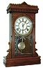 Waterbury Clock Co., Waterbury, Conn., "Elmwood", 8 days, time and strike walnut mantel clock, c1885