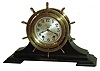 Seth Thomas Clock Co., Thomaston, Conn., "Ship's Wheel" 8 day brass ship's bells clock in mahogany cradle, c1932