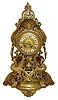 France, ornate cast brass mantel clock, the case with pierced Arabesque ornament, domed top, sides with large lion masks and drop handles, a pair of hybrid pea fowl - griffins beneath the clock, all on a round end base with mask decorated feet, cast bezel with convex beveled glass, cast dial with applied Roman numeral cartouches, blued steel hands, 8 days, time and strike, pendule a Paris movement, c1880