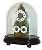 France , skeleton clock, the small 8 days, time and strike, movement also with displays for the alarm and date, brass movement of unconventional design with the time and strike functions driven by a single barrel, Brocot escapement, silk thread suspension, and pinned count wheel Roman numeral, white enamel dial showing the time, and two smaller, Arabic numeral white enamel dials for the alarm and date, all resting on an oval mahogany base with turned feet, and under a glass dome, 19th century