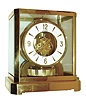 Jaeger - LeCoultre, Switzerland, "Atmos" clock, 15 jewel gilt caliber 528 movement, gilt torsion pendulum, round white painted dial with applied gilt Arabic numerals and arrow markers, gilt hands, all contained in a glazed rectangular case with removable front panel, serial #368346