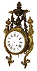 France, for Tiffany & Co., New York, large bronze wall clock, incomplete, round case with ornate cast bezel, the top with pierced urn festooned with a garland of fruit, the case sides with caryatids, Roman numeral white enamel dial signed "Tiffany & Compy. New York", 8 days, time and strike, movement also signed Tiffany, c1890