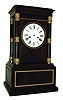 Jean Perrin, Paris, France, 8 days, time and strike, large mahogany table clock in the Directorie style with pendule a Paris movement with silk thread suspension and 5 3/8" diameter plates. Oak case with mahogany veneer case, gilt bronze mounted mahogany columns at the corners supporting a cavetto molded cornice, base with gilt, foliate ornamented trim, Roman numeral white enamel dial signed "Jn. Perrin a Paris", case back with ornate gilt bezel containing a thick beveled glass, c1810