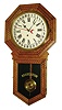 The E. Ingraham Co., Bristol, Conn., "Hartford" model 8 day time & calendar spring driven wall clock in pressed oak case, movement dated Apr., 1906.