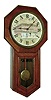 Seth Thomas Clock Co., Thomaston, Conn., "Globe" model 8 days, time only, drop octagon advertising wall clock in an oak case with personalized painted and hand colored advertising dial with a view of the establishment of "Arnheim the Tailor in the Manhattan's Bowery district 190, 192, & 194 Bowery at the corner of Spring St." [New York] with "MARKS ARNHEIM" substituted for numerals 1 - 12, c1890