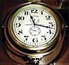 Longines, Switzerland, lever escapement chronometer with boxes, outer mahogany protective case containing the brass mounted, gimbaled box, the lid with plaque stating "Longines Chronometer Showing Observatory Time to the second", timepiece mounted in a weighted brass bowl, Arabic numeral silvered dial with wind indicator, blued steel spade and poker hands, 17 jewel caliber 21.29 movement with lever escapement and bimetallic balance, serial #6411684, c1910