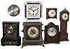 Clocks- 10 (Ten): Seth Thomas modern brass ship's bells; German porcelain plate with "Daniel Low, Salem, Mass." on dial; enameled wood Ingraham; Mission oak wall, Zaandam wall; United electric school clock; Seth Thomas plug-in alarm; Welby painted wood mantel; Sentinel 4-column plug-in Lanshire miniature tall clock all 20th century