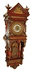 Ansonia Clock Co., New York, N.Y., "Hanging Antique" wall clock, 8 days, time and strike,, brass weight driven movement in a mahogany case with bronzed appliqu s and pressed brass dial with enamel numerals, c1904