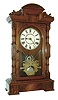 Seth Thomas Clock Co, Thomaston, Conn., "Hecla" 8 day spring driven three train movement with cathedral gong hour striking and quarter striking on two cupped bells in walnut shelf clock case, c1881.