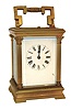 France, carriage clock, 8 days, time and strike, hour repeating movement with lever platform,  gilt case with Corinthian columns, molded cornice and base, beveled glasses, and carrying handle, Roman numeral white enamel dial, blued steel hands, c1910