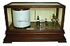 Barograph, London, England, for "Andrew J. Lloyd Co., Boston", mahogany and glass case, 8 day movement with cylinder escapement platform, c1910