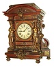 Ansonia Clock Co., New York, N.Y., "Senator" cabinet mantel clock, 8 days, time and strike, spring driven movement in a mahogany case with bronzed appliqu s and female figures flanking painted metal dial, c1905