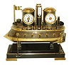 Reproduction, Battleship, based on a French Industrial series original of the 1890s, ship with 12 guns, and armored bow, with time only, clock and barometer mounted to the gun turrets, and with thermometer, all mounted to a polished black slate base, and with engraved brass plaque, "Made in Britain 1865", c2014