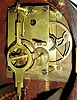 Herschede Clock Co., Cincinnati, Ohio, 8 days, brass weight driven patent or banjo timepiece with a movement supplied by the Derry Mfg Co., Derry, NH c1912. Herschede purchased Derry Mfg Co. tools and equipment and shipped it to Cincinnati in 1912.