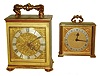 Clocks- 2 (Two) Swiss-made Imhof bracket-style desk clocks, both 8 day with top handles and silvered chapter rings; larger one is time and strike; both later 20th century.