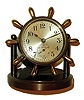 Chelsea Clock Co., Boston, "Clinton" model 8 day time only, desk clock in bronze tilting case with brass yacht wheel handles, c1930