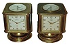 Clocks- 2 (Two): Angelus, Swiss swiveling weather stations in brass cases, 8 day timepieces with barometers, Celsius & Fahrenheit thermometers, hygrometers and top compasses. One has "CPC Golden Jubilee NCR 1954" on top.