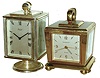 Clocks- 2 (Two): Swiss-made weather stations, both 8 day timepieces in swiveling brass cases with thermometers, barometers, and hygrometers; one Imhof; one Guardier with alarm, c1960