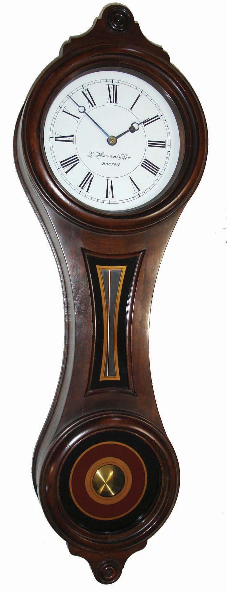 E. Howard &amp; Co., Boston, Mass., ÒRegulator No. 10Ó figure eight reissue wall clock no. 269, 8 days, time only, weight driven movement, walnut case, painted metal dial, reverse painted throat and lower tablets, dated 1976. — Antique Clocks Price Guide