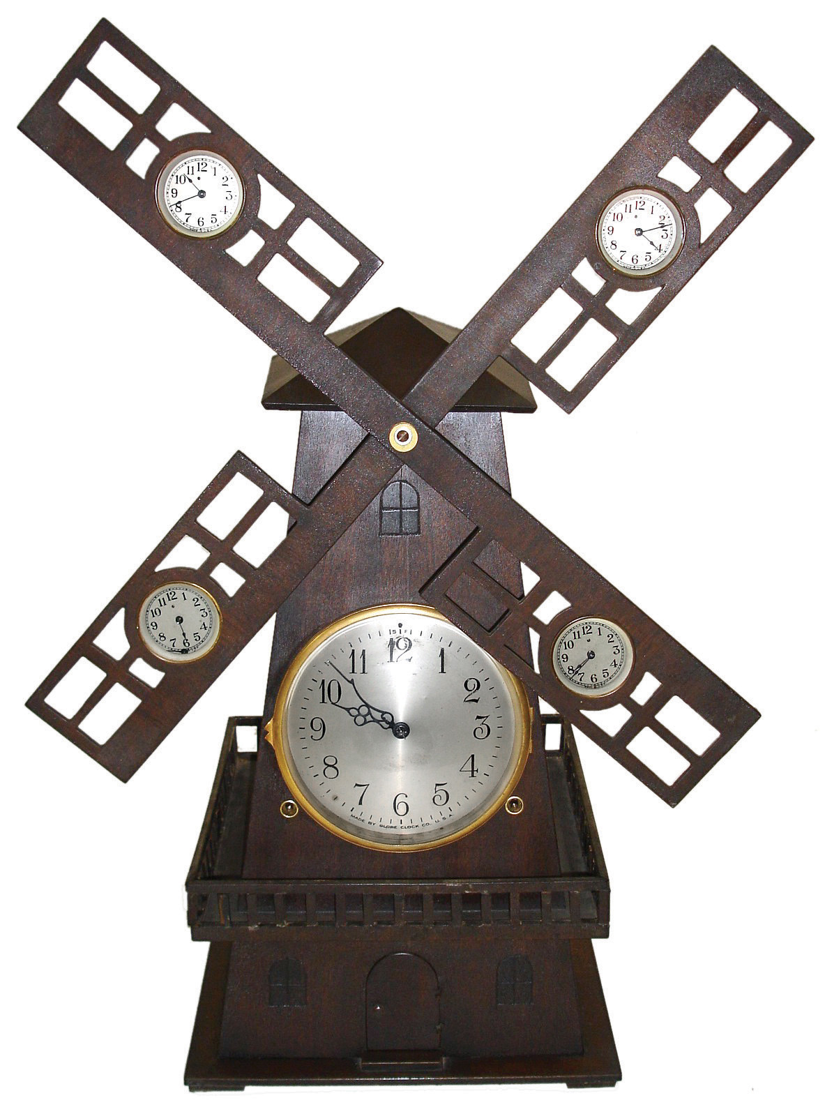 Globe Clock Co., USA., 8 days, time and strike, windmill novelty clock with wood case with 4 small auxiliary dials on vanes, Movement is German, c1925. — Antique Clocks Price Guide