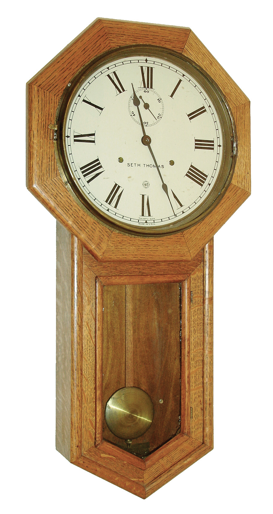 Seth Thomas Clock Co., Thomaston, Conn., ÒGLOBEÓ model, oak cased drop octagon school clock with large double spring 30 day timepiece movement, c1910 — Antique Clocks Price Guide