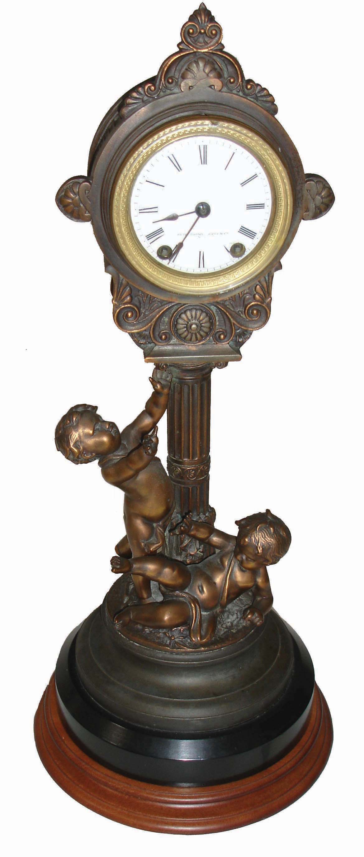 Seth Thomas Sons &amp; Co., New York, NY, ÒNo. 8064Ó bronzed figural 15 day, time and strike, mantel clock, c1872, with later turned hardwood base — Antique Clocks Price Guide