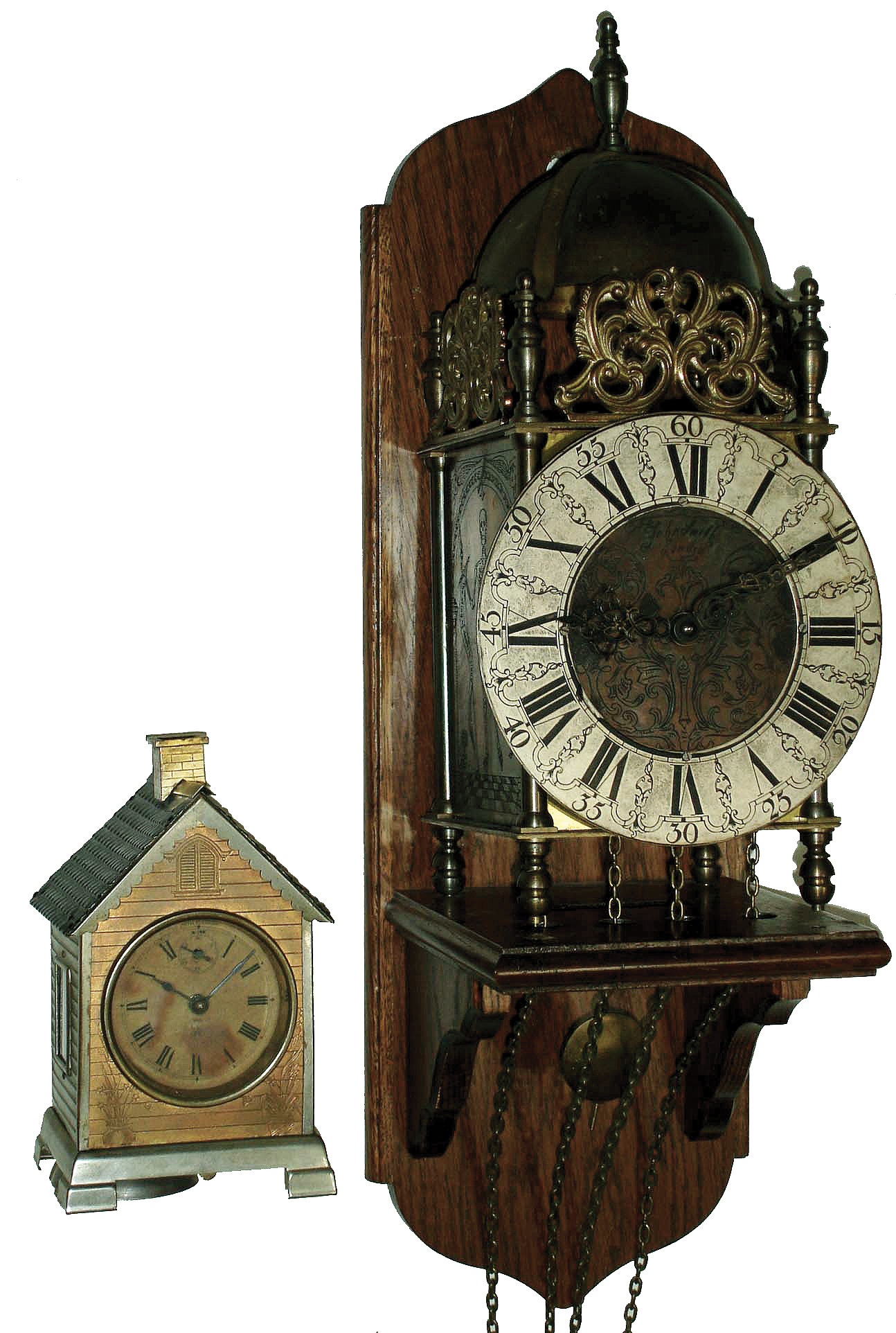 Clocks- 5 (Five) and a barometer: (1) Reproduction German, 8 days, time and strike, weight-driven lantern clock with Hermle 241-070 movement made in 1984 and wooden wall bracket; (2) Seth Thomas ÓLodgeÒ model house-shape thirty-hour, time and strike, novelty clock, c1900; (3) Winterhalder &amp; Hoffmeir, Germany, for J.E. Caldwell &amp; Co., inlaid mahogany, 8 days, dual chime 3 train small bracket clock with 9 jewel balance platform, c1900 (4) Barr Mfg. Corp., Weedsport, NY, electric battery mantel clock, c1920 (5) Russian modern submarine timepiece in heavy metal case, c1920 (6) German walnut hanging barometer, 20th century — Antique Clocks Price Guide